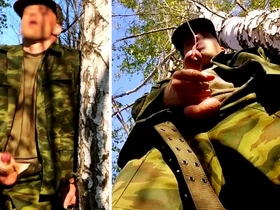 Russian soldier with a big dick on a military mission in the forest shoots sperm from his penis at opponents